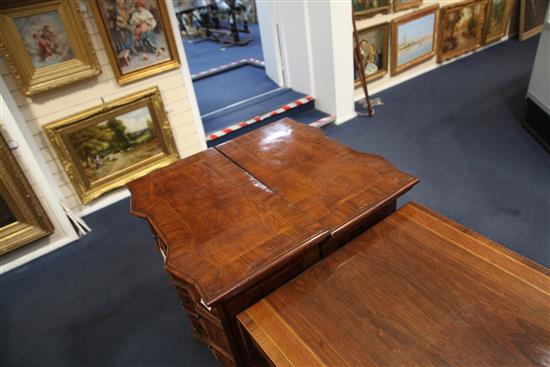 A pair of 18th century Italian walnut commodes, W.2ft 4in. D.1ft 4in. H.2ft 9in.